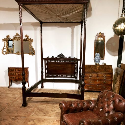Exceptional quality, original Regency Period Four Poster Bed in the Chippendale style with carved and fluted posts all round which are crisply carved in a decorative manner. Date: Early 19th Century